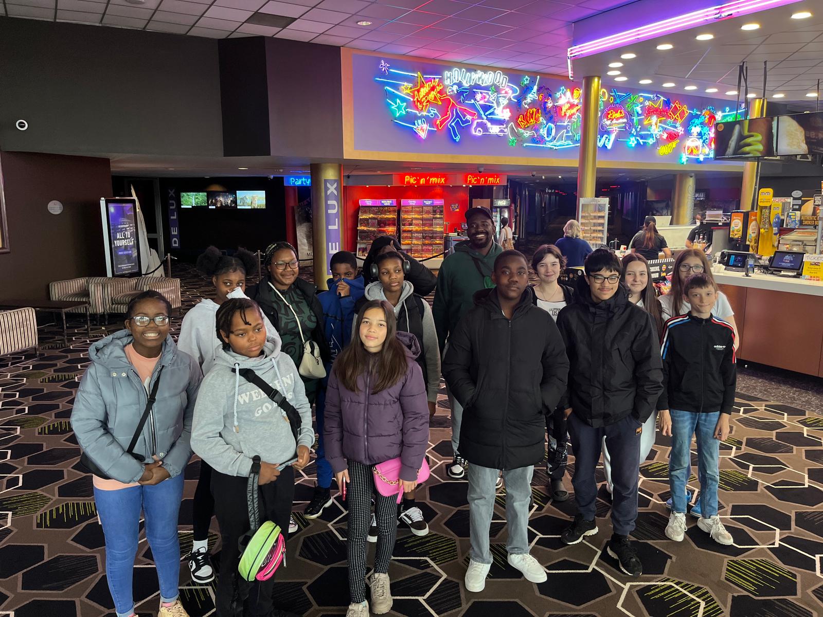 Young people enjoying trip to an arcade